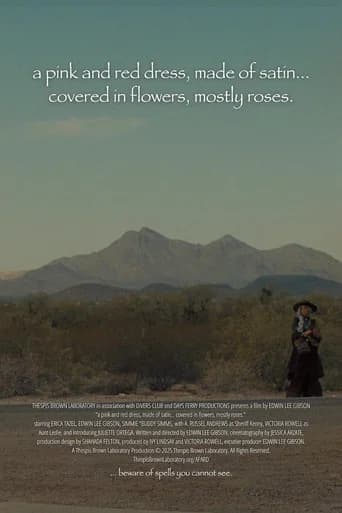 a pink and red dress, made of satin… covered in flowers, mostly roses