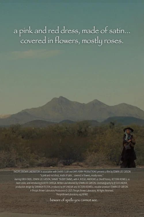 a pink and red dress, made of satin… covered in flowers, mostly roses